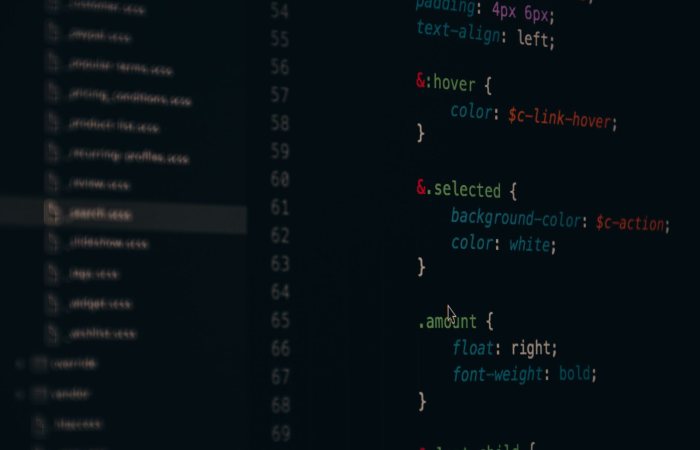 Close-up of colorful CSS code lines on a computer screen for web development.